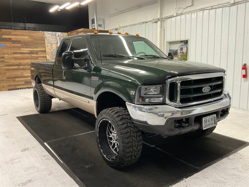 1999 Ford F-250 Lariat 4Dr Extended Cab 4X4 / 7.3L DIESEL / LIFTED  / BRAND NEW 35 " MUD TIRES & 22 " WHEELS / Leather / LONG BED / LOCAL TRUCK / RUST FREE - Photo 2 - Gladstone, OR 97027