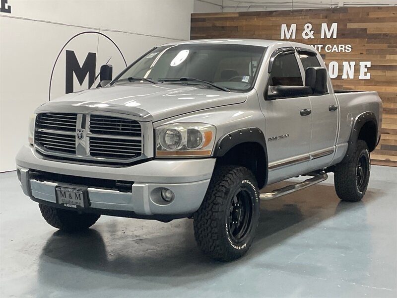 2006 Dodge Ram 2500 Laramie Quad Cab 4X4 / 5.9L DIESEL /Leather Heated / SHORT BED / LEVELED w. BF GOODRICH TIRES & RACELINE BLACK WHEELS / ZERO RUST - Photo 1 - Gladstone, OR 97027