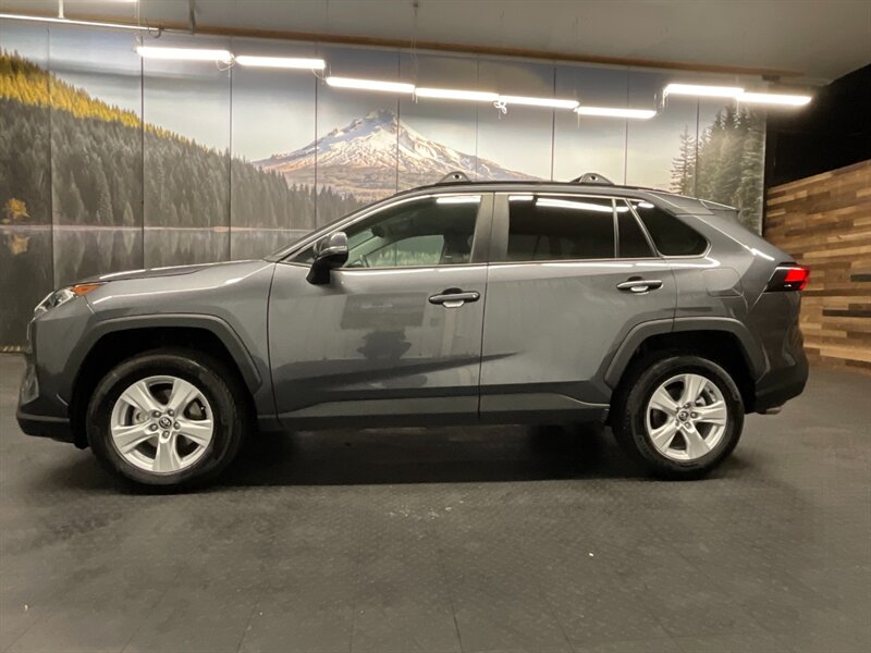 2021 Toyota RAV4 XLE Sport Utility AWD / 1-OWNER/ 15,000 MILES   - Photo 3 - Gladstone, OR 97027