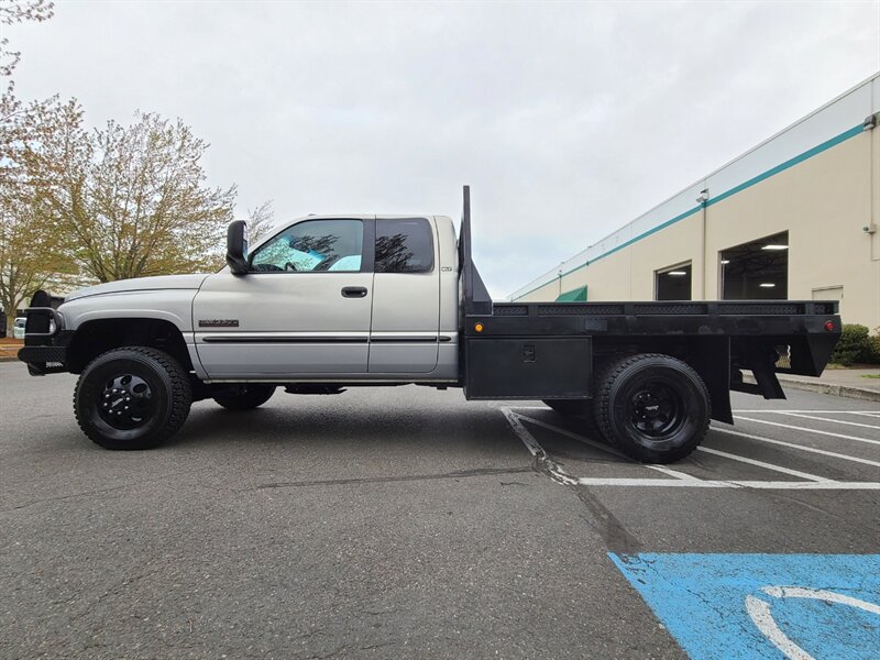 2000 Dodge Ram 3500 Dually FLAT BED / 4X4 / Laramie / 5.9L CUMMINS  Turbo DIESEL / LOW MILES / 1-TON - Photo 3 - Portland, OR 97217