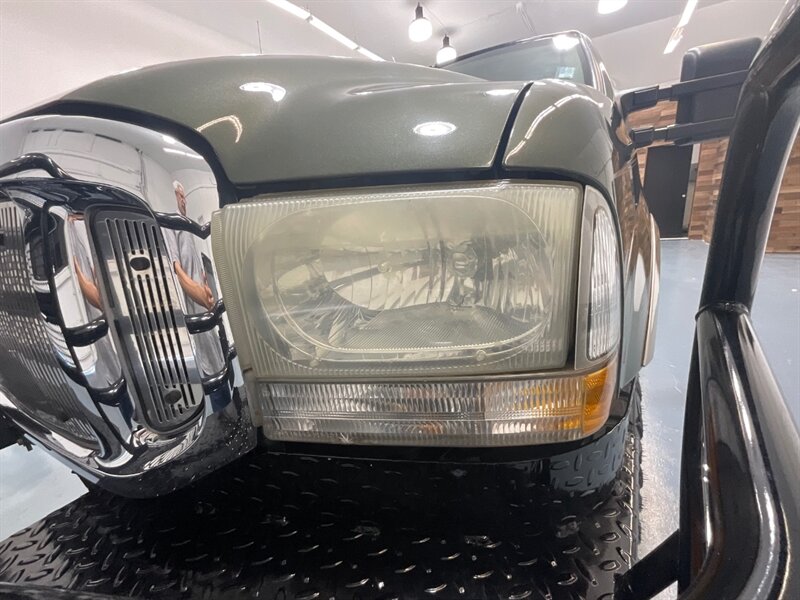 2002 Ford Excursion Limited 4X4 / 7.3L DIESEL / Leather / ZERO RUST / 3RD ROW SEAT / Heated Leather Seats / LEVELED - Photo 26 - Gladstone, OR 97027