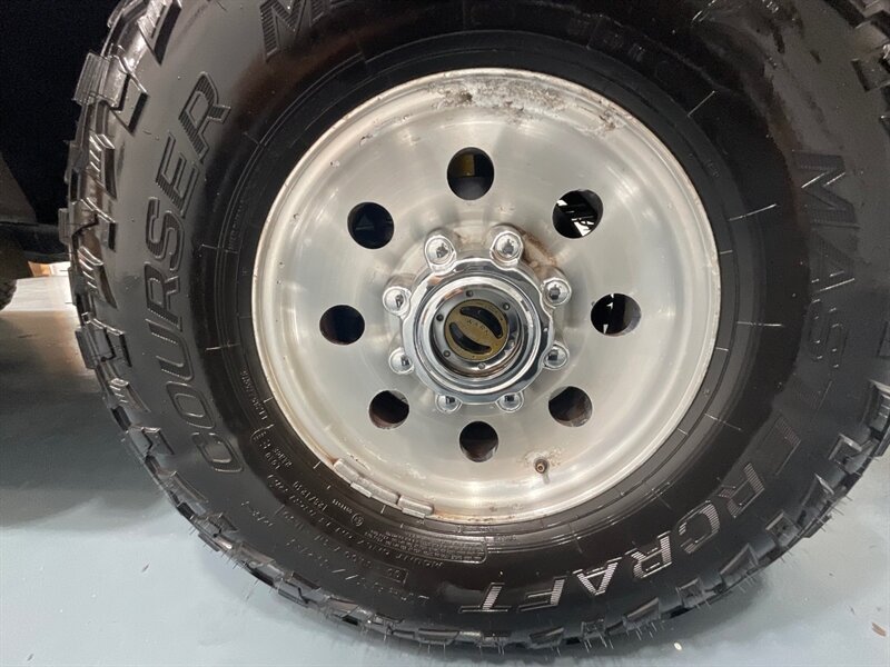 2002 Ford Excursion Limited 4X4 / 7.3L DIESEL / Leather / ZERO RUST / 3RD ROW SEAT / Heated Leather Seats / LEVELED - Photo 48 - Gladstone, OR 97027