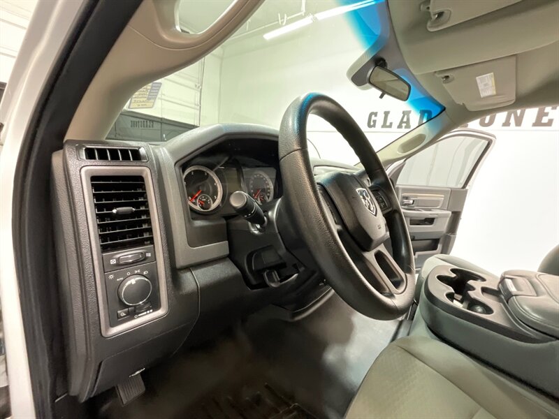 2013 RAM 3500 Tradesman Regular Cab 4X4 / 6.7L DIESEL / DUALLY / FLAT BED / LONG BED / ZERO RUST / FUEL WHEELS / TRAILER BRAKE CONTROLLER - Photo 35 - Gladstone, OR 97027