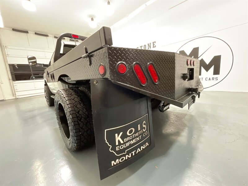 2013 RAM 3500 Tradesman Regular Cab 4X4 / 6.7L DIESEL / DUALLY / FLAT BED / LONG BED / ZERO RUST / FUEL WHEELS / TRAILER BRAKE CONTROLLER - Photo 51 - Gladstone, OR 97027