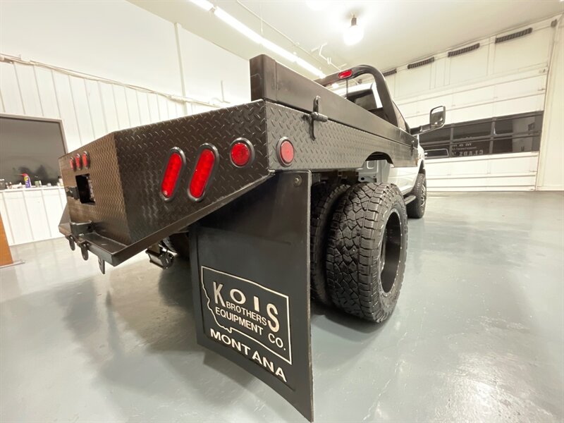 2013 RAM 3500 Tradesman Regular Cab 4X4 / 6.7L DIESEL / DUALLY / FLAT BED / LONG BED / ZERO RUST / FUEL WHEELS / TRAILER BRAKE CONTROLLER - Photo 52 - Gladstone, OR 97027