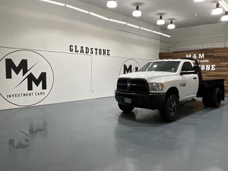 2013 RAM 3500 Tradesman Regular Cab 4X4 / 6.7L DIESEL / DUALLY / FLAT BED / LONG BED / ZERO RUST / FUEL WHEELS / TRAILER BRAKE CONTROLLER - Photo 25 - Gladstone, OR 97027