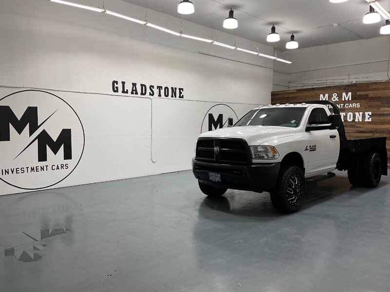 2013 RAM 3500 Tradesman Regular Cab 4X4 / 6.7L DIESEL / DUALLY / FLAT BED / LONG BED / ZERO RUST / FUEL WHEELS / TRAILER BRAKE CONTROLLER - Photo 56 - Gladstone, OR 97027