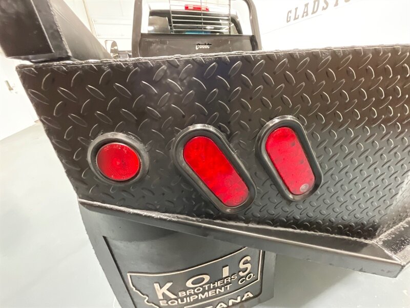 2013 RAM 3500 Tradesman Regular Cab 4X4 / 6.7L DIESEL / DUALLY / FLAT BED / LONG BED / ZERO RUST / FUEL WHEELS / TRAILER BRAKE CONTROLLER - Photo 28 - Gladstone, OR 97027