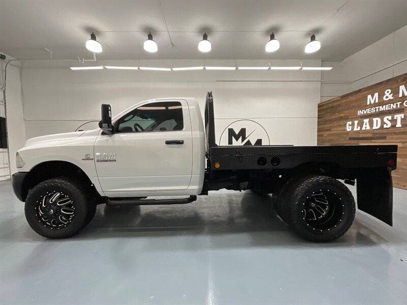 2013 RAM 3500 Tradesman Regular Cab 4X4 / 6.7L DIESEL / DUALLY / FLAT BED / LONG BED / ZERO RUST / FUEL WHEELS / TRAILER BRAKE CONTROLLER - Photo 3 - Gladstone, OR 97027