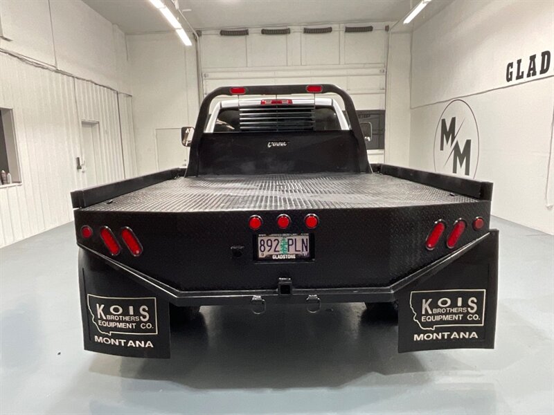 2013 RAM 3500 Tradesman Regular Cab 4X4 / 6.7L DIESEL / DUALLY / FLAT BED / LONG BED / ZERO RUST / FUEL WHEELS / TRAILER BRAKE CONTROLLER - Photo 6 - Gladstone, OR 97027