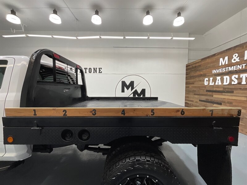 2013 RAM 3500 Tradesman Regular Cab 4X4 / 6.7L DIESEL / DUALLY / FLAT BED / LONG BED / ZERO RUST / FUEL WHEELS / TRAILER BRAKE CONTROLLER - Photo 9 - Gladstone, OR 97027