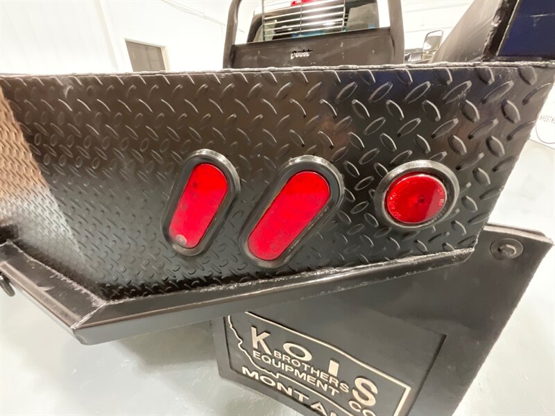 2013 RAM 3500 Tradesman Regular Cab 4X4 / 6.7L DIESEL / DUALLY / FLAT BED / LONG BED / ZERO RUST / FUEL WHEELS / TRAILER BRAKE CONTROLLER - Photo 29 - Gladstone, OR 97027