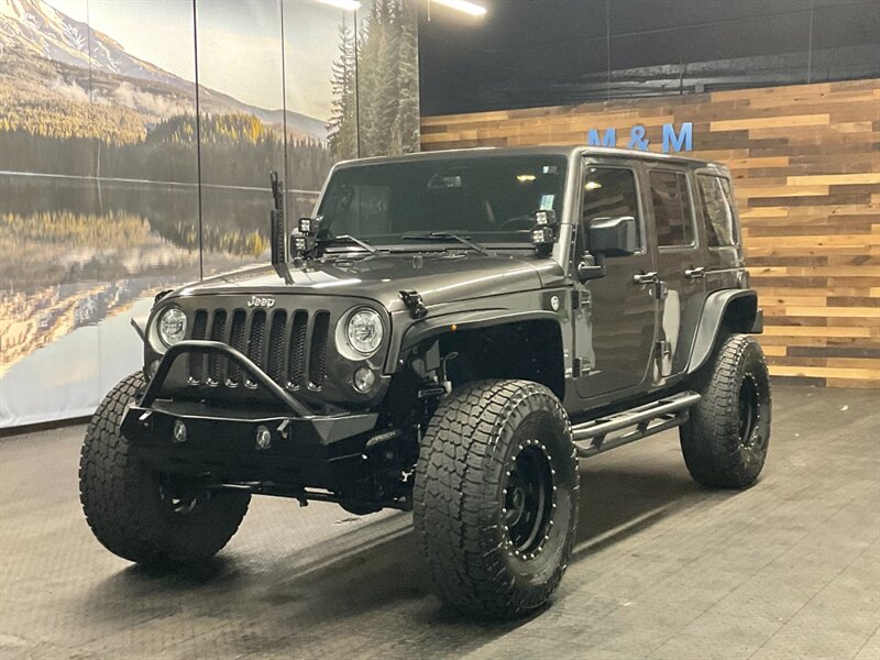 2017 Jeep Wrangler Unlimited Sahara 4X4 / Leather / Hard top / LIFTED   - Photo 1 - Gladstone, OR 97027