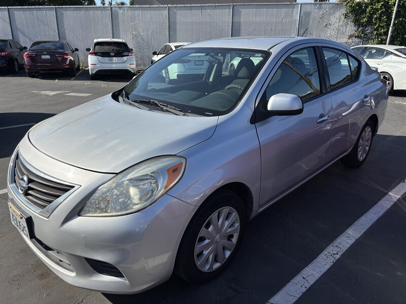 Silver 2014 Nissan Versa Sedan Front-Wheel Drive Automatic