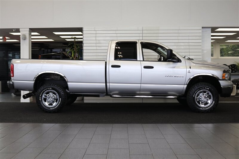 2004 Dodge Ram 2500 1-OWNER* 100% RUST & CORROSION FREE* 100% STOCK* NEW 33 " BFG KO3 10-PLYs* FRESHLY SERVICED* SPRAY IN BED LINER* 6-PASSENGER* ALL ORIGINAL BOOKS & MANUALS* CAMPER TIE DOWNS - Photo 5 - Portland, OR 97230