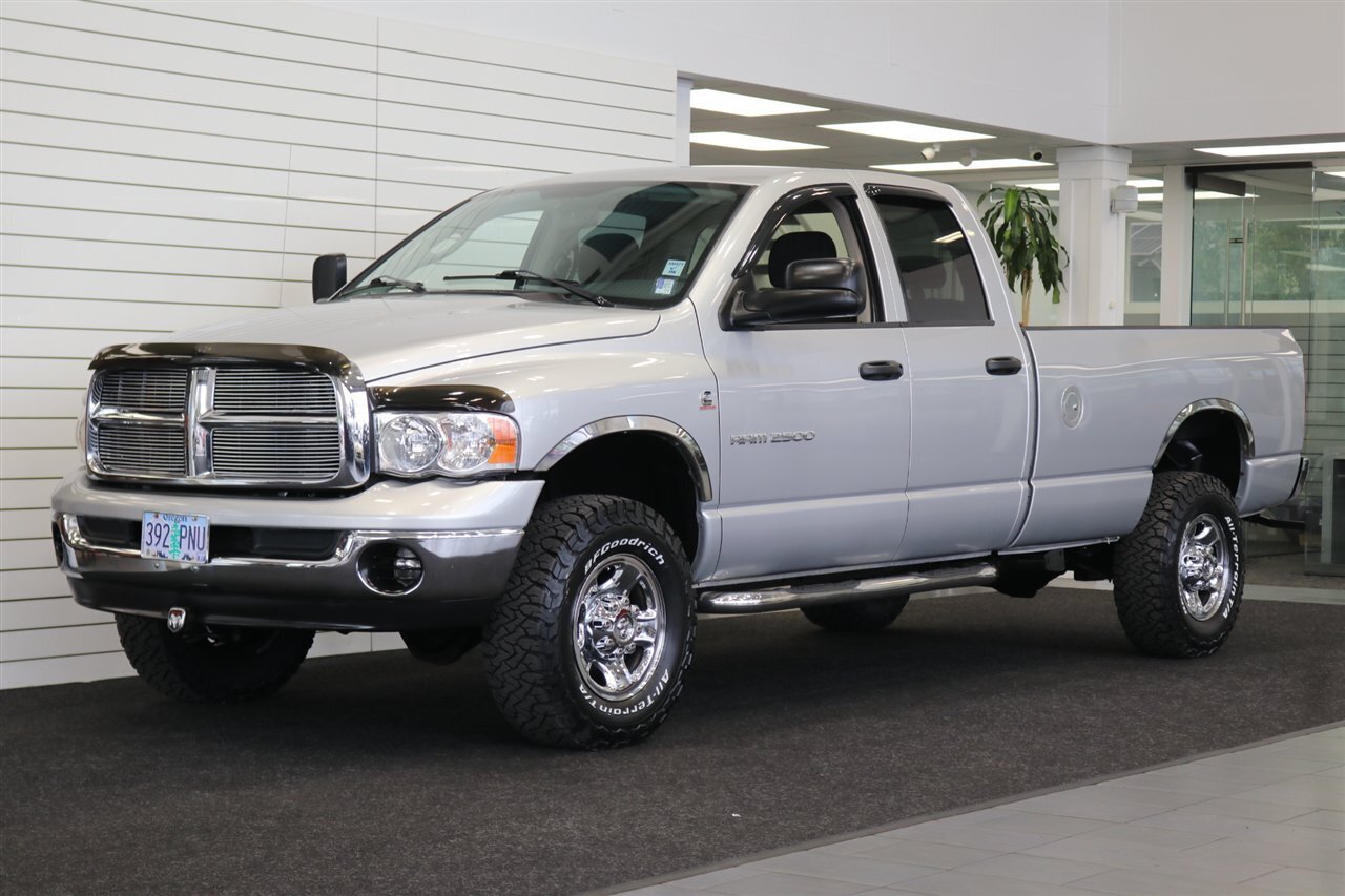 2004 Dodge Ram 2500  1-OWNER* 100% RUST & CORROSION FREE* 100% STOCK* NEW 33 " BFG KO3 10-PLYs* FRESHLY SERVICED* SPRAY IN BED LINER* 6-PASSENGER* ALL ORIGINAL BOOKS & MANUALS* CAMPER TIE DOWNS - Photo 1 - Portland, OR 97230