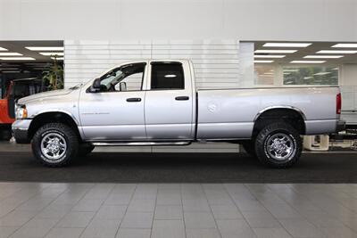 2004 Dodge Ram 2500 1-OWNER* 100% RUST & CORROSION FREE* 100% STOCK* NEW 33 " BFG KO3 10-PLYs* FRESHLY SERVICED* SPRAY IN BED LINER* 6-PASSENGER* ALL ORIGINAL BOOKS & MANUALS* CAMPER TIE DOWNS - Photo 4 - Portland, OR 97230