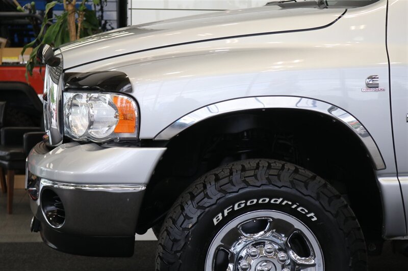 2004 Dodge Ram 2500 1-OWNER* 100% RUST & CORROSION FREE* 100% STOCK* NEW 33 " BFG KO3 10-PLYs* FRESHLY SERVICED* SPRAY IN BED LINER* 6-PASSENGER* ALL ORIGINAL BOOKS & MANUALS* CAMPER TIE DOWNS - Photo 11 - Portland, OR 97230