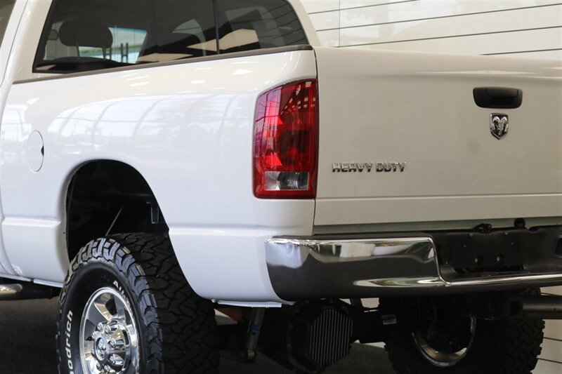 2005 Dodge Ram 2500 SLT 4dr Quad Cab SLT  1-ARIZONA OWNER* 100% RUST & ACCIDENT FREE* NEW 3 "BILSTEIN LEVEL KIT* NEW 35 "BFG KO3* NEW BALL JOINTS/HUBS/TIE RODS* ALL BOOKS & MANUALS & WINDOW STICKER* NV5600 6-SPD - Photo 39 - Portland, OR 97230