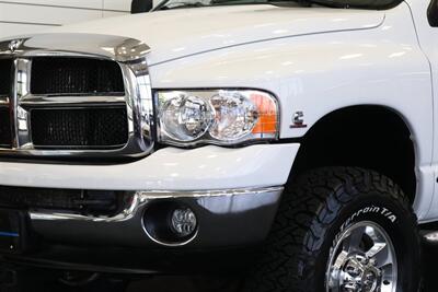 2005 Dodge Ram 2500 SLT 4dr Quad Cab SLT  1-ARIZONA OWNER* 100% RUST & ACCIDENT FREE* NEW 3 "BILSTEIN LEVEL KIT* NEW 35 "BFG KO3* NEW BALL JOINTS/HUBS/TIE RODS* ALL BOOKS & MANUALS & WINDOW STICKER* NV5600 6-SPD - Photo 12 - Portland, OR 97230