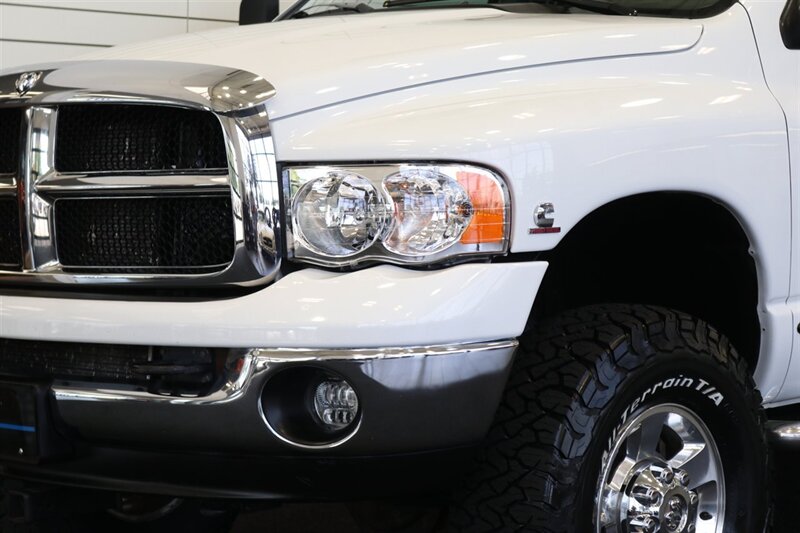 2005 Dodge Ram 2500 SLT 4dr Quad Cab SLT  1-ARIZONA OWNER* 100% RUST & ACCIDENT FREE* NEW 3 "BILSTEIN LEVEL KIT* NEW 35 "BFG KO3* NEW BALL JOINTS/HUBS/TIE RODS* ALL BOOKS & MANUALS & WINDOW STICKER* NV5600 6-SPD - Photo 12 - Portland, OR 97230