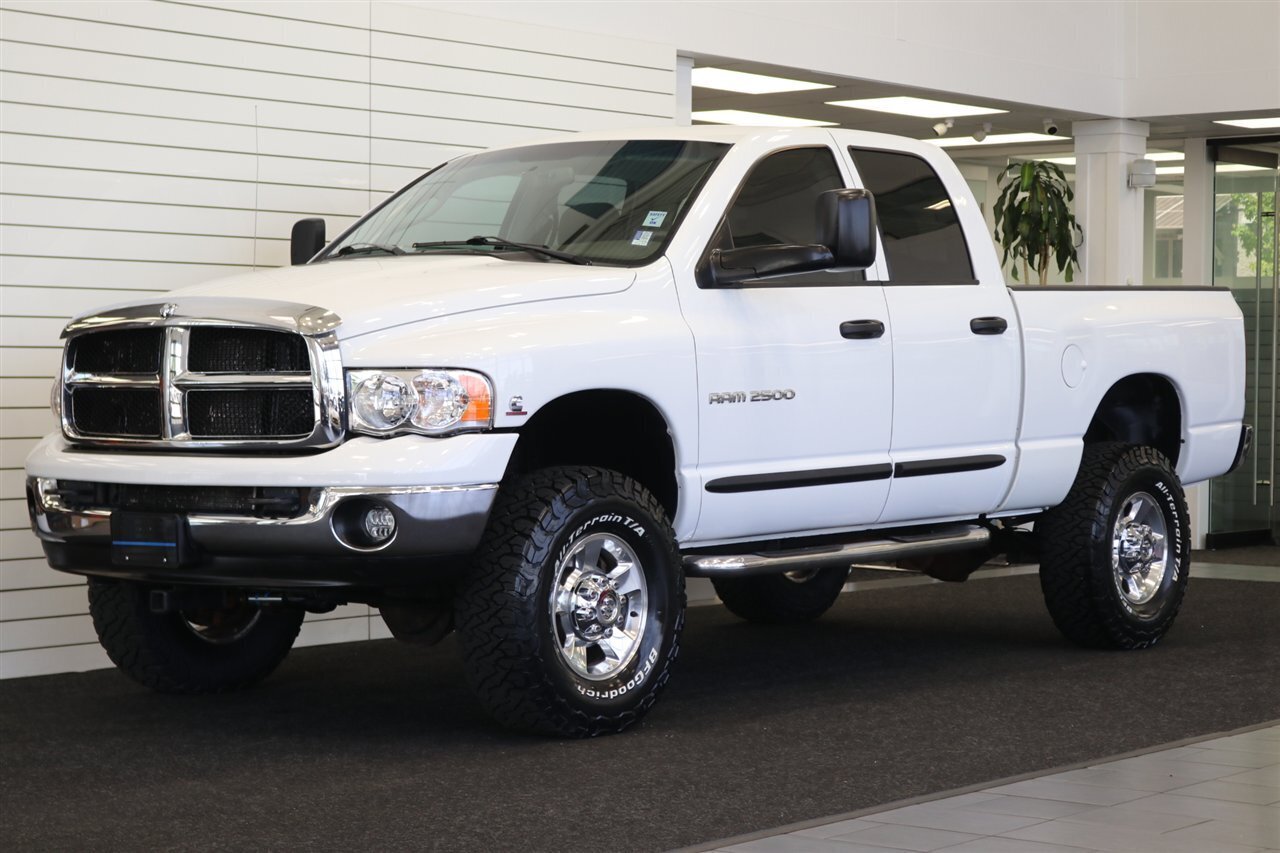 2005 Dodge Ram 2500 SLT 4dr Quad Cab SLT  1-ARIZONA OWNER* 100% RUST & ACCIDENT FREE* NEW 3 "BILSTEIN LEVEL KIT* NEW 35 "BFG KO3* NEW BALL JOINTS/HUBS/TIE RODS* ALL BOOKS & MANUALS & WINDOW STICKER* NV5600 6-SPD - Photo 1 - Portland, OR 97230