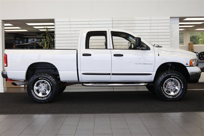 2005 Dodge Ram 2500 SLT 4dr Quad Cab SLT  1-ARIZONA OWNER* 100% RUST & ACCIDENT FREE* NEW 3 "BILSTEIN LEVEL KIT* NEW 35 "BFG KO3* NEW BALL JOINTS/HUBS/TIE RODS* ALL BOOKS & MANUALS & WINDOW STICKER* NV5600 6-SPD - Photo 5 - Portland, OR 97230