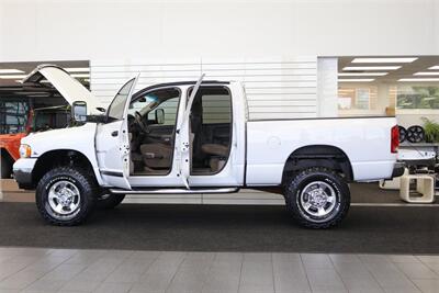 2005 Dodge Ram 2500 SLT 4dr Quad Cab SLT  1-ARIZONA OWNER* 100% RUST & ACCIDENT FREE* NEW 3 "BILSTEIN LEVEL KIT* NEW 35 "BFG KO3* NEW BALL JOINTS/HUBS/TIE RODS* ALL BOOKS & MANUALS & WINDOW STICKER* NV5600 6-SPD - Photo 10 - Portland, OR 97230