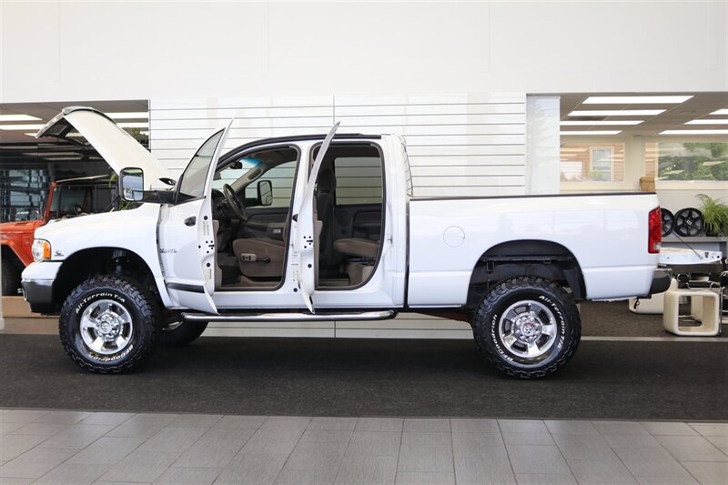 2005 Dodge Ram 2500 SLT 4dr Quad Cab SLT  1-ARIZONA OWNER* 100% RUST & ACCIDENT FREE* NEW 3 "BILSTEIN LEVEL KIT* NEW 35 "BFG KO3* NEW BALL JOINTS/HUBS/TIE RODS* ALL BOOKS & MANUALS & WINDOW STICKER* NV5600 6-SPD - Photo 10 - Portland, OR 97230