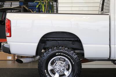 2005 Dodge Ram 2500 SLT 4dr Quad Cab SLT  1-ARIZONA OWNER* 100% RUST & ACCIDENT FREE* NEW 3 "BILSTEIN LEVEL KIT* NEW 35 "BFG KO3* NEW BALL JOINTS/HUBS/TIE RODS* ALL BOOKS & MANUALS & WINDOW STICKER* NV5600 6-SPD - Photo 49 - Portland, OR 97230