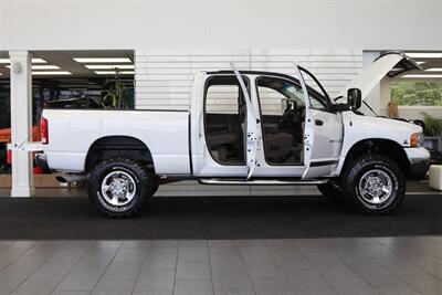 2005 Dodge Ram 2500 SLT 4dr Quad Cab SLT  1-ARIZONA OWNER* 100% RUST & ACCIDENT FREE* NEW 3 "BILSTEIN LEVEL KIT* NEW 35 "BFG KO3* NEW BALL JOINTS/HUBS/TIE RODS* ALL BOOKS & MANUALS & WINDOW STICKER* NV5600 6-SPD - Photo 11 - Portland, OR 97230