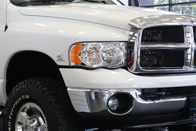 2005 Dodge Ram 2500 SLT 4dr Quad Cab SLT  1-ARIZONA OWNER* 100% RUST & ACCIDENT FREE* NEW 3 "BILSTEIN LEVEL KIT* NEW 35 "BFG KO3* NEW BALL JOINTS/HUBS/TIE RODS* ALL BOOKS & MANUALS & WINDOW STICKER* NV5600 6-SPD - Photo 13 - Portland, OR 97230