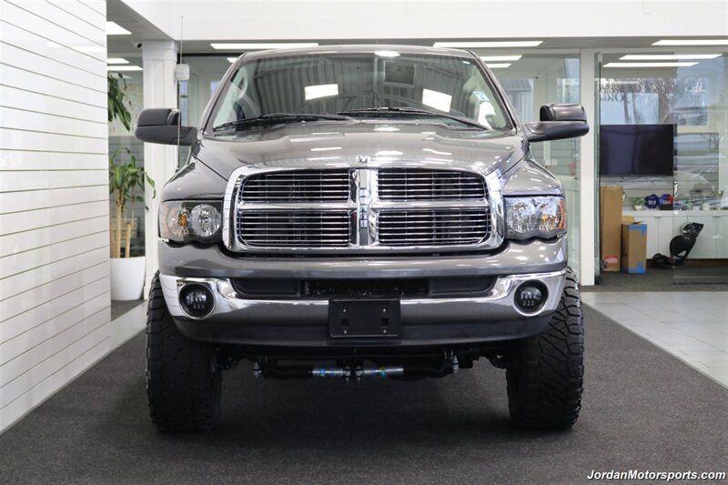 2004 Dodge Ram 2500 SLT  5.9L HO W/6-SPD MANUAL* SOUTHBEND CLUTCH DUAL DISC* S&B INTAKE* 4 "TURBO BACK MBRP EXHAUST* WIRELESS REAR AIRBAGS W/ONBOARD COMPRESSOR* 35 "NITTOs 20 "FUELS* DUAL BILSTEIN 5100 STEERING STABILIZERS - Photo 7 - Portland, OR 97230