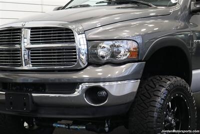 2004 Dodge Ram 2500 SLT  5.9L HO W/6-SPD MANUAL* SOUTHBEND CLUTCH DUAL DISC* S&B INTAKE* 4 "TURBO BACK MBRP EXHAUST* WIRELESS REAR AIRBAGS W/ONBOARD COMPRESSOR* 35 "NITTOs 20 "FUELS* DUAL BILSTEIN 5100 STEERING STABILIZERS - Photo 11 - Portland, OR 97230