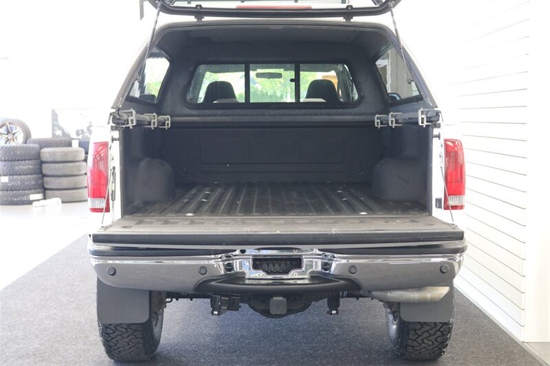 2002 Ford F-350 XLT  1-OWNER* 100% RUST FREE* 55K MLS ONLY* DEALER SERVICED SINCE NEW* NEW 35 " BFG KO3s W/ 3 " LEVEL LIFT & NEW BILSTEIN 5100s & DUAL BILSTEIN STEERING STABILIZERS*LINEX BED LINER*ALL BOOKS/MANUALS/KEYS - Photo 15 - Portland, OR 97230