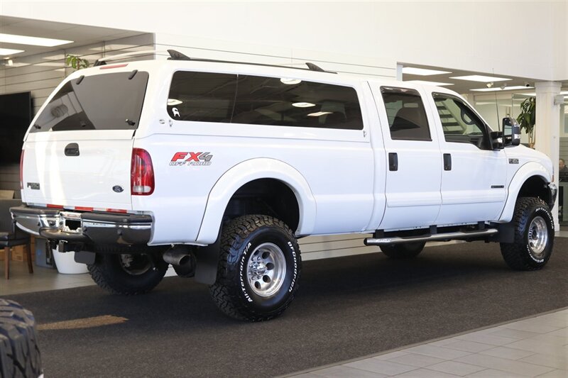 2002 Ford F-350 XLT  1-OWNER* 100% RUST FREE* 55K MLS ONLY* DEALER SERVICED SINCE NEW* NEW 35 " BFG KO3s W/ 3 " LEVEL LIFT & NEW BILSTEIN 5100s & DUAL BILSTEIN STEERING STABILIZERS*LINEX BED LINER*ALL BOOKS/MANUALS/KEYS - Photo 7 - Portland, OR 97230