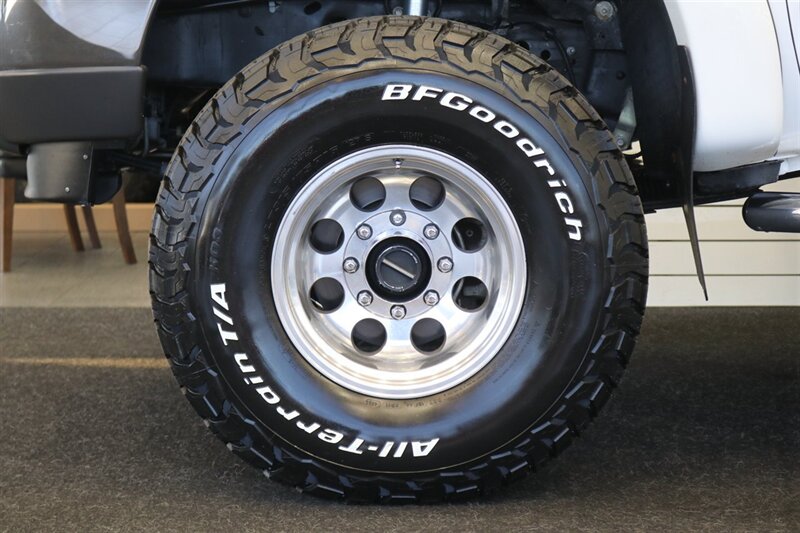 2002 Ford F-350 XLT  1-OWNER* 100% RUST FREE* 55K MLS ONLY* DEALER SERVICED SINCE NEW* NEW 35 " BFG KO3s W/ 3 " LEVEL LIFT & NEW BILSTEIN 5100s & DUAL BILSTEIN STEERING STABILIZERS*LINEX BED LINER*ALL BOOKS/MANUALS/KEYS - Photo 20 - Portland, OR 97230