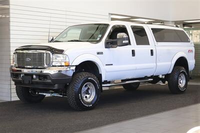 2002 Ford F-350 XLT  1-OWNER* 100% RUST FREE* 55K MLS ONLY* DEALER SERVICED SINCE NEW* NEW 35 " BFG KO3s W/ 3 " LEVEL LIFT & NEW BILSTEIN 5100s & DUAL BILSTEIN STEERING STABILIZERS*LINEX BED LINER*ALL BOOKS/MANUALS/KEYS - Photo 1 - Portland, OR 97230