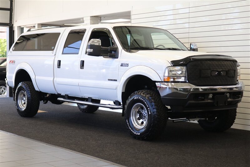 2002 Ford F-350 XLT  1-OWNER* 100% RUST FREE* 55K MLS ONLY* DEALER SERVICED SINCE NEW* NEW 35 " BFG KO3s W/ 3 " LEVEL LIFT & NEW BILSTEIN 5100s & DUAL BILSTEIN STEERING STABILIZERS*LINEX BED LINER*ALL BOOKS/MANUALS/KEYS - Photo 2 - Portland, OR 97230