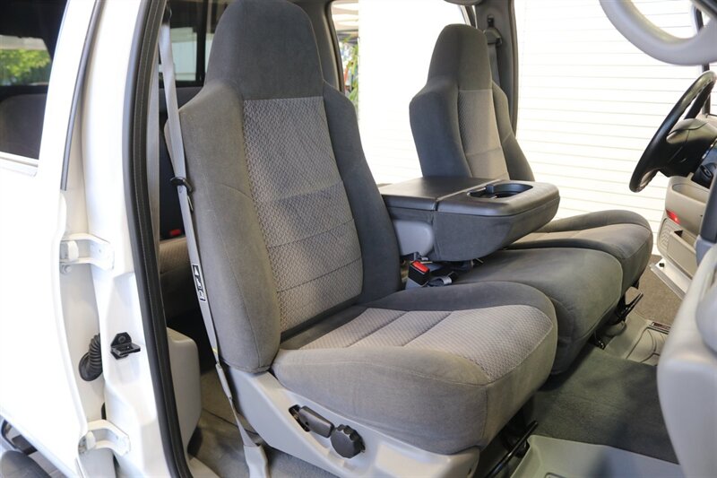 2002 Ford F-350 XLT  1-OWNER* 100% RUST FREE* 55K MLS ONLY* DEALER SERVICED SINCE NEW* NEW 35 " BFG KO3s W/ 3 " LEVEL LIFT & NEW BILSTEIN 5100s & DUAL BILSTEIN STEERING STABILIZERS*LINEX BED LINER*ALL BOOKS/MANUALS/KEYS - Photo 17 - Portland, OR 97230