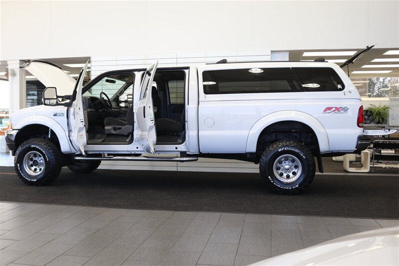 2002 Ford F-350 XLT  1-OWNER* 100% RUST FREE* 55K MLS ONLY* DEALER SERVICED SINCE NEW* NEW 35 " BFG KO3s W/ 3 " LEVEL LIFT & NEW BILSTEIN 5100s & DUAL BILSTEIN STEERING STABILIZERS*LINEX BED LINER*ALL BOOKS/MANUALS/KEYS - Photo 10 - Portland, OR 97230