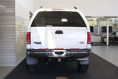 2002 Ford F-350 XLT  1-OWNER* 100% RUST FREE* 55K MLS ONLY* DEALER SERVICED SINCE NEW* NEW 35 " BFG KO3s W/ 3 " LEVEL LIFT & NEW BILSTEIN 5100s & DUAL BILSTEIN STEERING STABILIZERS*LINEX BED LINER*ALL BOOKS/MANUALS/KEYS - Photo 9 - Portland, OR 97230