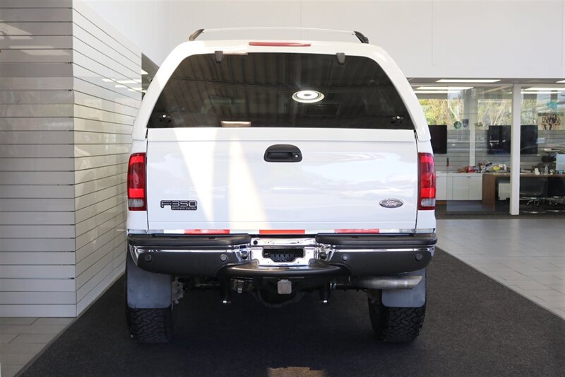 2002 Ford F-350 XLT  1-OWNER* 100% RUST FREE* 55K MLS ONLY* DEALER SERVICED SINCE NEW* NEW 35 " BFG KO3s W/ 3 " LEVEL LIFT & NEW BILSTEIN 5100s & DUAL BILSTEIN STEERING STABILIZERS*LINEX BED LINER*ALL BOOKS/MANUALS/KEYS - Photo 9 - Portland, OR 97230