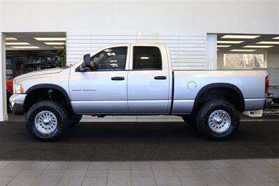 2004 Dodge Ram 2500 SLT 4dr Quad Cab SLT  1-OWNER* 6-SPEED MANUAL* 5.9L HIGH OUTPUT* NEW 3 "BILSTEIN LEVEL KIT* BILSTEIN 5100 SHOCKS* NEW 35 " NITTO G3 10-PLYs* REAR AIR BAGS* SPRAY IN BED LINER* AFE COLD AIR INTAKE - Photo 4 - Portland, OR 97230