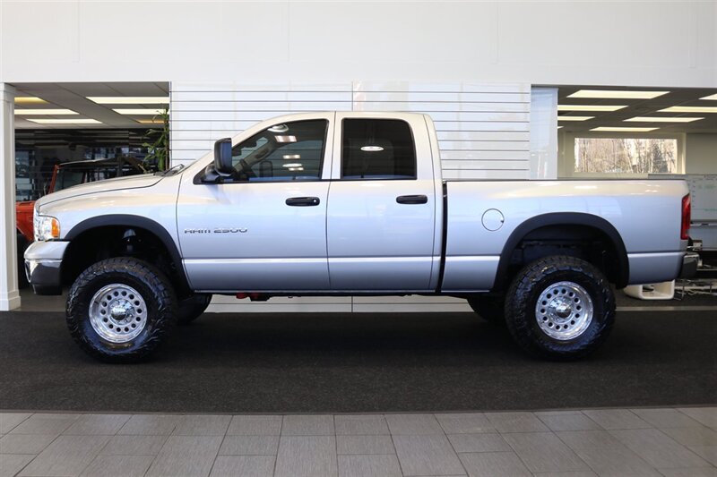 2004 Dodge Ram 2500 SLT 4dr Quad Cab SLT  1-OWNER* 6-SPEED MANUAL* 5.9L HIGH OUTPUT* NEW 3 "BILSTEIN LEVEL KIT* BILSTEIN 5100 SHOCKS* NEW 35 " NITTO G3 10-PLYs* REAR AIR BAGS* SPRAY IN BED LINER* AFE COLD AIR INTAKE - Photo 4 - Portland, OR 97230