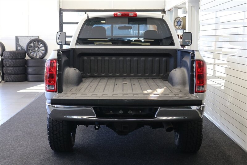 2004 Dodge Ram 2500 SLT 4dr Quad Cab SLT  1-OWNER* 6-SPEED MANUAL* 5.9L HIGH OUTPUT* NEW 3 "BILSTEIN LEVEL KIT* BILSTEIN 5100 SHOCKS* NEW 35 " NITTO G3 10-PLYs* REAR AIR BAGS* SPRAY IN BED LINER* AFE COLD AIR INTAKE - Photo 15 - Portland, OR 97230