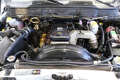 2004 Dodge Ram 2500 SLT 4dr Quad Cab SLT  1-OWNER* 6-SPEED MANUAL* 5.9L HIGH OUTPUT* NEW 3 "BILSTEIN LEVEL KIT* BILSTEIN 5100 SHOCKS* NEW 35 " NITTO G3 10-PLYs* REAR AIR BAGS* SPRAY IN BED LINER* AFE COLD AIR INTAKE - Photo 14 - Portland, OR 97230