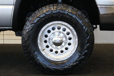 2004 Dodge Ram 2500 SLT 4dr Quad Cab SLT  1-OWNER* 6-SPEED MANUAL* 5.9L HIGH OUTPUT* NEW 3 "BILSTEIN LEVEL KIT* BILSTEIN 5100 SHOCKS* NEW 35 " NITTO G3 10-PLYs* REAR AIR BAGS* SPRAY IN BED LINER* AFE COLD AIR INTAKE - Photo 52 - Portland, OR 97230