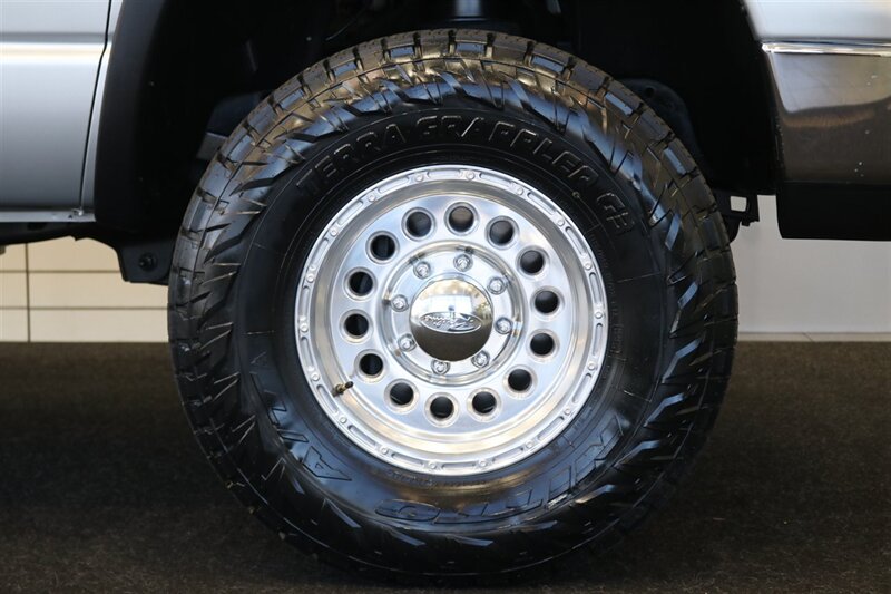 2004 Dodge Ram 2500 SLT 4dr Quad Cab SLT  1-OWNER* 6-SPEED MANUAL* 5.9L HIGH OUTPUT* NEW 3 "BILSTEIN LEVEL KIT* BILSTEIN 5100 SHOCKS* NEW 35 " NITTO G3 10-PLYs* REAR AIR BAGS* SPRAY IN BED LINER* AFE COLD AIR INTAKE - Photo 52 - Portland, OR 97230