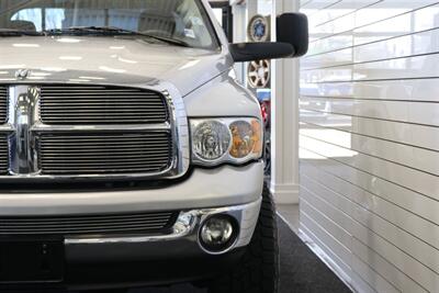 2004 Dodge Ram 2500 SLT 4dr Quad Cab SLT  1-OWNER* 6-SPEED MANUAL* 5.9L HIGH OUTPUT* NEW 3 "BILSTEIN LEVEL KIT* BILSTEIN 5100 SHOCKS* NEW 35 " NITTO G3 10-PLYs* REAR AIR BAGS* SPRAY IN BED LINER* AFE COLD AIR INTAKE - Photo 54 - Portland, OR 97230